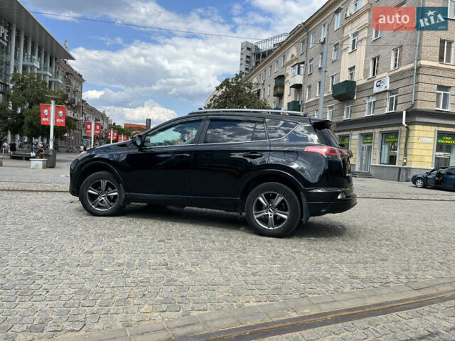 Черный Тойота РАВ 4, объемом двигателя 2.49 л и пробегом 140 тыс. км за 16999 $, фото 3 на Automoto.ua