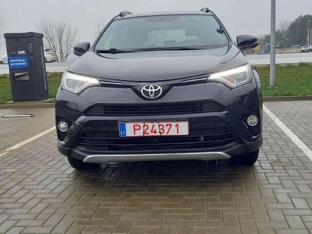 Черный Тойота РАВ 4, объемом двигателя 2 л и пробегом 128 тыс. км за 9100 $, фото 1 на Automoto.ua