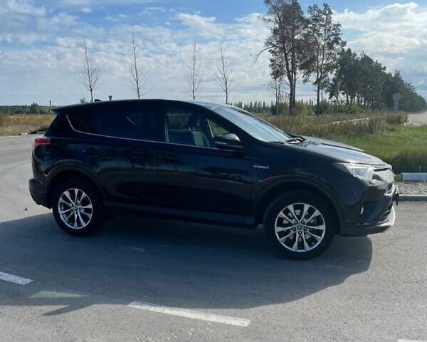 Черный Тойота РАВ 4, объемом двигателя 2.5 л и пробегом 122 тыс. км за 26000 $, фото 4 на Automoto.ua