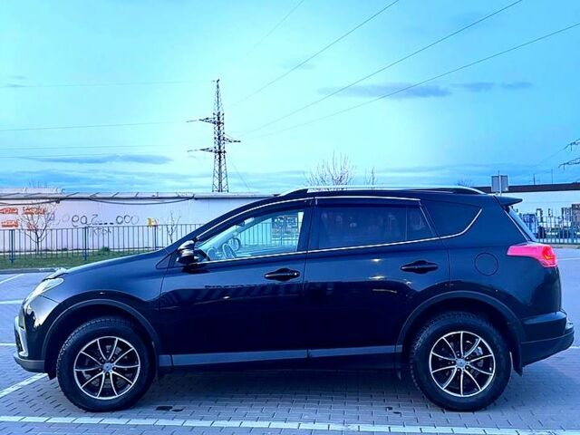 Черный Тойота РАВ 4, объемом двигателя 2 л и пробегом 95 тыс. км за 19000 $, фото 2 на Automoto.ua