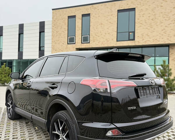 Черный Тойота РАВ 4, объемом двигателя 2.23 л и пробегом 198 тыс. км за 19600 $, фото 49 на Automoto.ua