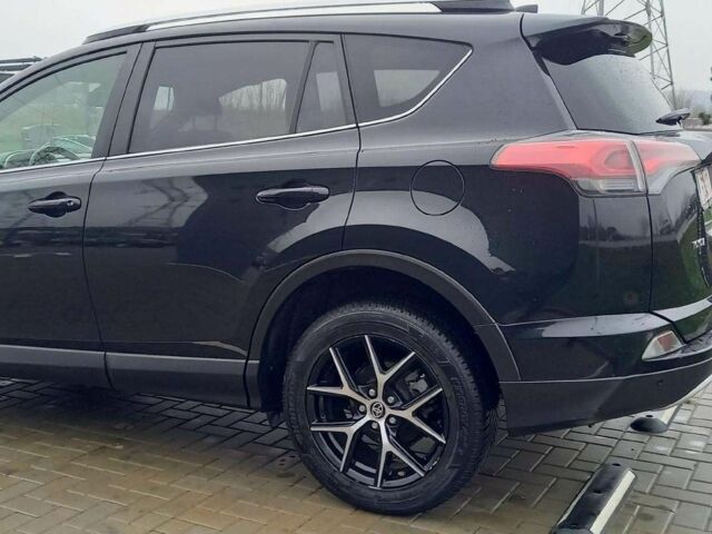 Черный Тойота РАВ 4, объемом двигателя 2 л и пробегом 128 тыс. км за 9100 $, фото 4 на Automoto.ua