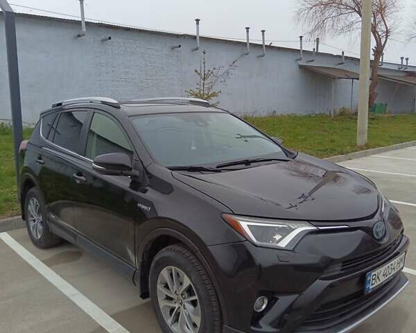Чорний Тойота РАВ 4, об'ємом двигуна 2.5 л та пробігом 121 тис. км за 20999 $, фото 1 на Automoto.ua