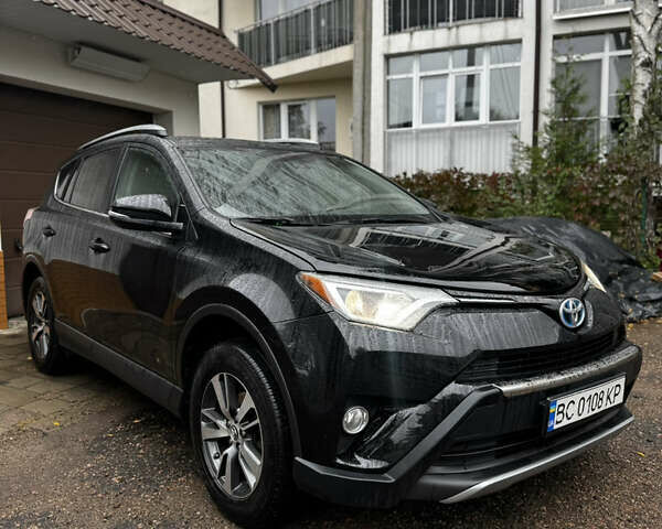 Тойота РАВ 4 2016 в Львове на Automoto.ua Черный Тойота РАВ 4, объемом двигателя 2.49 л и пробегом 120 тыс. км за 16999 $, фото 2 на Automoto.ua