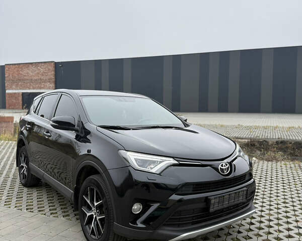 Черный Тойота РАВ 4, объемом двигателя 2.23 л и пробегом 198 тыс. км за 19600 $, фото 2 на Automoto.ua