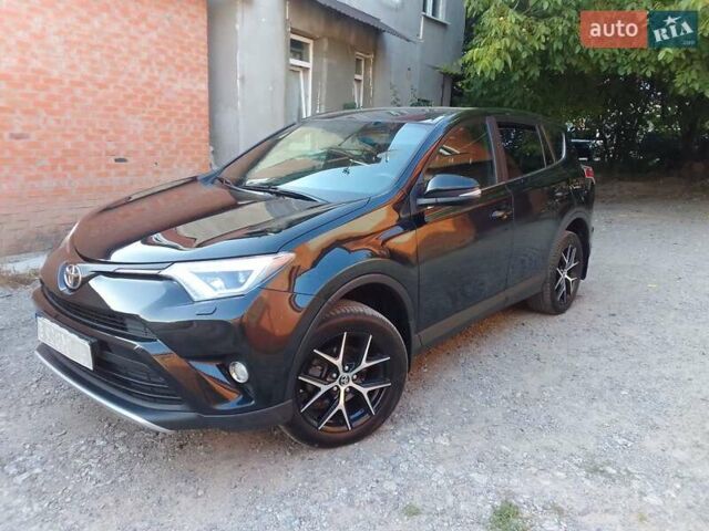 Чорний Тойота РАВ 4, об'ємом двигуна 1.99 л та пробігом 150 тис. км за 20700 $, фото 9 на Automoto.ua