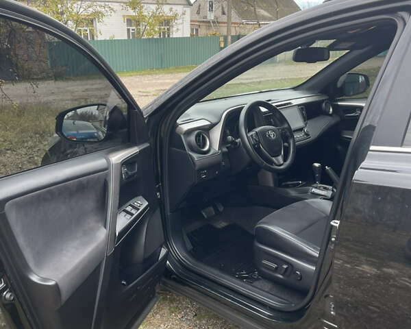 Черный Тойота РАВ 4, объемом двигателя 2.23 л и пробегом 187 тыс. км за 19100 $, фото 8 на Automoto.ua