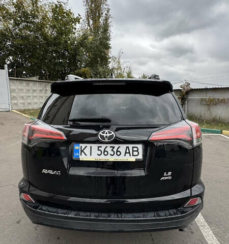 Чорний Тойота РАВ 4, об'ємом двигуна 2.49 л та пробігом 128 тис. км за 23200 $, фото 2 на Automoto.ua