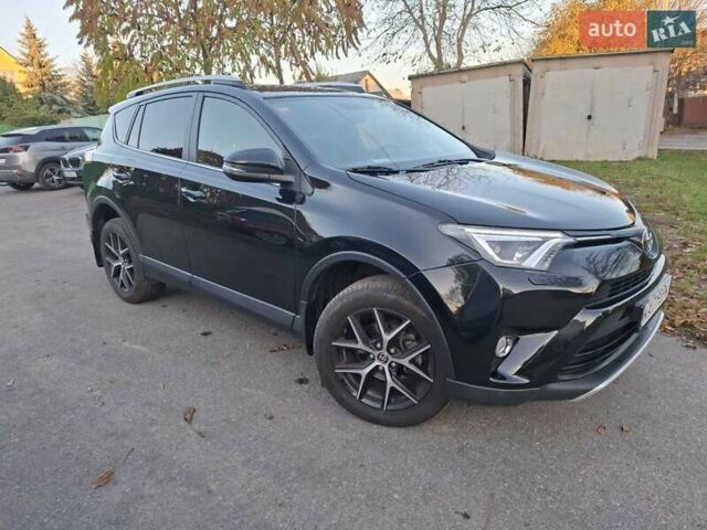 Чорний Тойота РАВ 4, об'ємом двигуна 2 л та пробігом 151 тис. км за 20700 $, фото 4 на Automoto.ua