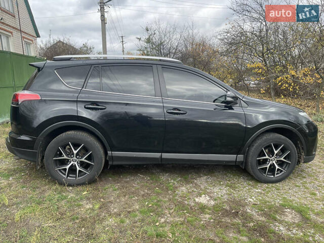 Черный Тойота РАВ 4, объемом двигателя 2.23 л и пробегом 187 тыс. км за 19100 $, фото 4 на Automoto.ua