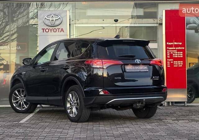 Чорний Тойота РАВ 4, об'ємом двигуна 2.49 л та пробігом 219 тис. км за 21939 $, фото 1 на Automoto.ua