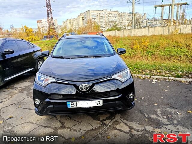 Черный Тойота РАВ 4, объемом двигателя 2.5 л и пробегом 128 тыс. км за 23000 $, фото 3 на Automoto.ua