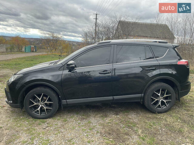 Черный Тойота РАВ 4, объемом двигателя 2.23 л и пробегом 187 тыс. км за 19100 $, фото 3 на Automoto.ua