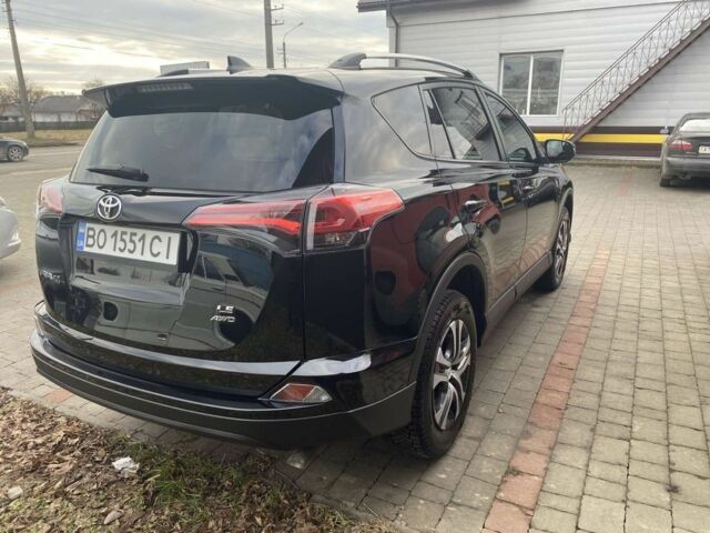 Чорний Тойота РАВ 4, об'ємом двигуна 2.5 л та пробігом 103 тис. км за 17500 $, фото 1 на Automoto.ua