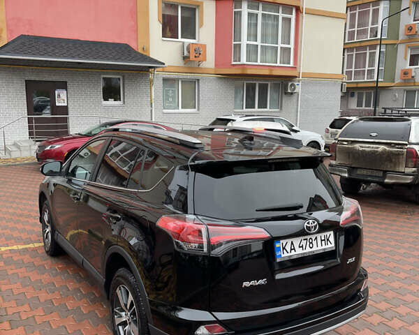 Черный Тойота РАВ 4, объемом двигателя 2.49 л и пробегом 98 тыс. км за 22000 $, фото 3 на Automoto.ua