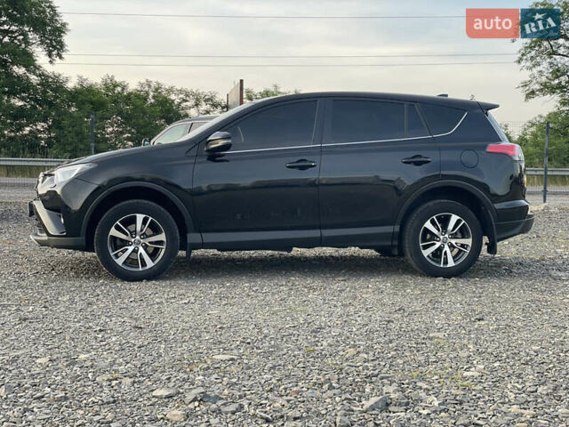 Чорний Тойота РАВ 4, об'ємом двигуна 2 л та пробігом 180 тис. км за 22700 $, фото 1 на Automoto.ua