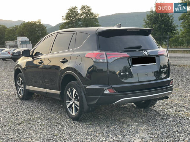 Чорний Тойота РАВ 4, об'ємом двигуна 2 л та пробігом 180 тис. км за 22700 $, фото 2 на Automoto.ua