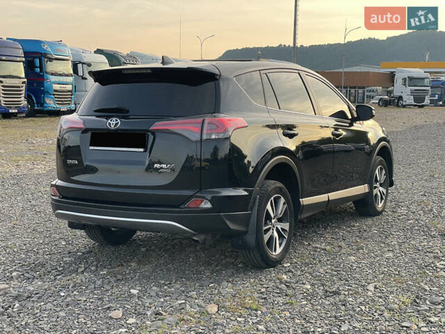 Чорний Тойота РАВ 4, об'ємом двигуна 2 л та пробігом 180 тис. км за 22700 $, фото 3 на Automoto.ua