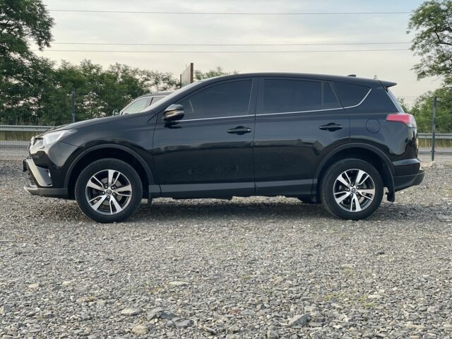 Черный Тойота РАВ 4, объемом двигателя 2 л и пробегом 180 тыс. км за 22700 $, фото 1 на Automoto.ua