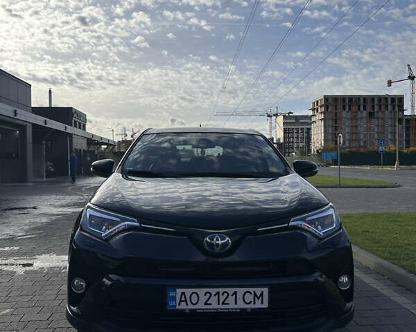 Чорний Тойота РАВ 4, об'ємом двигуна 2.5 л та пробігом 263 тис. км за 21000 $, фото 1 на Automoto.ua