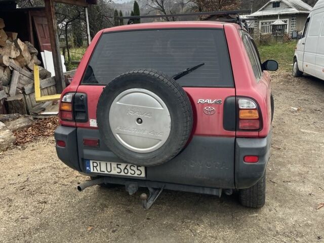 Красный Тойота РАВ 4, объемом двигателя 2 л и пробегом 290 тыс. км за 2700 $, фото 1 на Automoto.ua