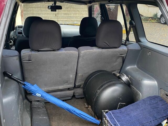 Красный Тойота РАВ 4, объемом двигателя 2 л и пробегом 440 тыс. км за 6300 $, фото 4 на Automoto.ua