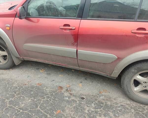 Красный Тойота РАВ 4, объемом двигателя 2 л и пробегом 370 тыс. км за 3500 $, фото 2 на Automoto.ua