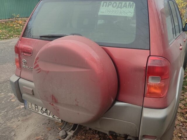 Красный Тойота РАВ 4, объемом двигателя 2 л и пробегом 370 тыс. км за 3500 $, фото 1 на Automoto.ua