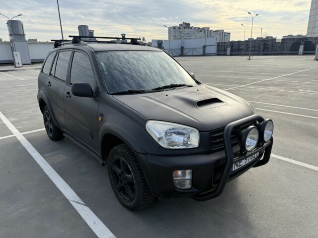 Красный Тойота РАВ 4, объемом двигателя 2 л и пробегом 262 тыс. км за 4000 $, фото 3 на Automoto.ua