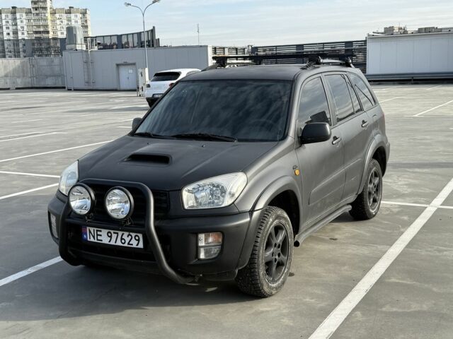 Красный Тойота РАВ 4, объемом двигателя 2 л и пробегом 262 тыс. км за 4000 $, фото 1 на Automoto.ua