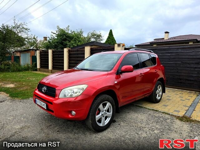 Червоний Тойота РАВ 4, об'ємом двигуна 2 л та пробігом 200 тис. км за 7500 $, фото 10 на Automoto.ua