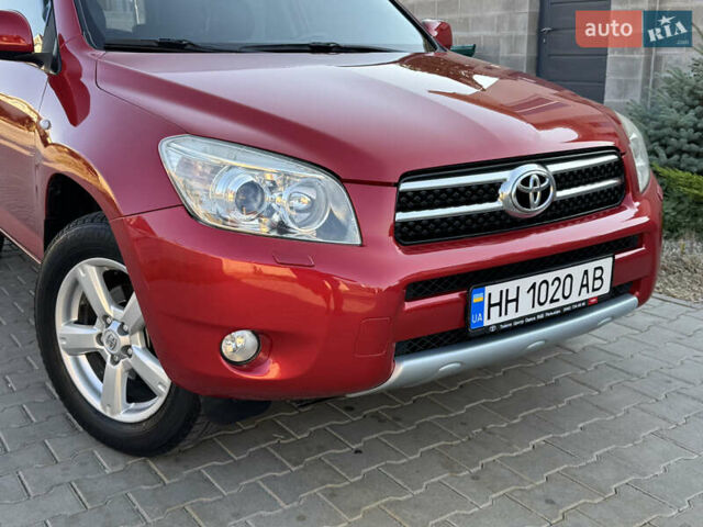 Червоний Тойота РАВ 4, об'ємом двигуна 2 л та пробігом 180 тис. км за 8999 $, фото 3 на Automoto.ua