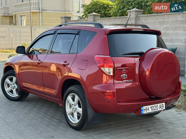 Червоний Тойота РАВ 4, об'ємом двигуна 2 л та пробігом 180 тис. км за 8999 $, фото 40 на Automoto.ua
