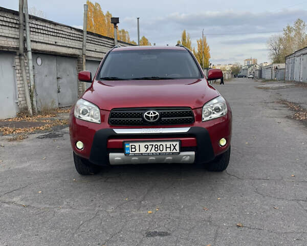 Червоний Тойота РАВ 4, об'ємом двигуна 2 л та пробігом 195 тис. км за 8999 $, фото 1 на Automoto.ua