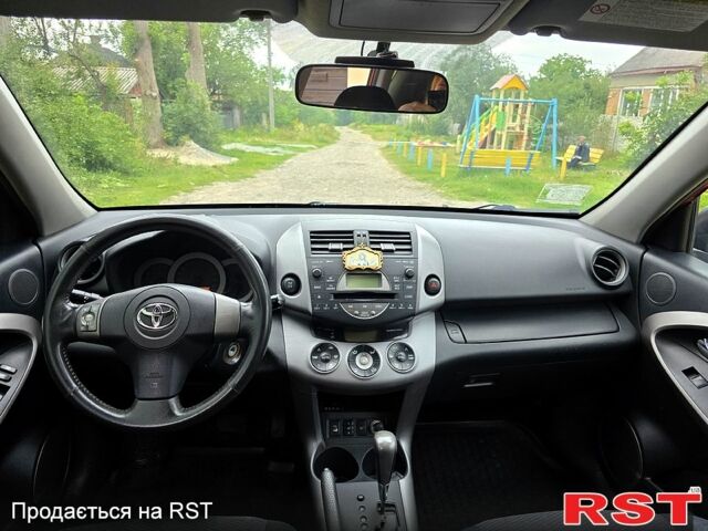 Червоний Тойота РАВ 4, об'ємом двигуна 2 л та пробігом 200 тис. км за 7500 $, фото 12 на Automoto.ua