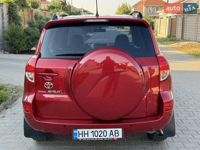 Червоний Тойота РАВ 4, об'ємом двигуна 2 л та пробігом 180 тис. км за 8999 $, фото 14 на Automoto.ua