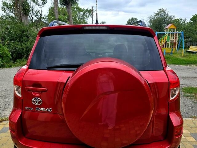 Червоний Тойота РАВ 4, об'ємом двигуна 2 л та пробігом 200 тис. км за 7500 $, фото 3 на Automoto.ua