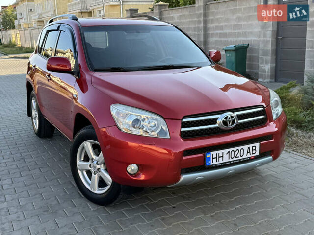 Червоний Тойота РАВ 4, об'ємом двигуна 2 л та пробігом 180 тис. км за 8999 $, фото 9 на Automoto.ua
