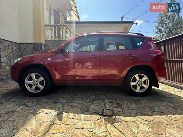 Красный Тойота РАВ 4, объемом двигателя 2 л и пробегом 98 тыс. км за 10700 $, фото 1 на Automoto.ua