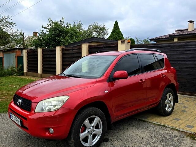 Червоний Тойота РАВ 4, об'ємом двигуна 2 л та пробігом 200 тис. км за 7500 $, фото 11 на Automoto.ua