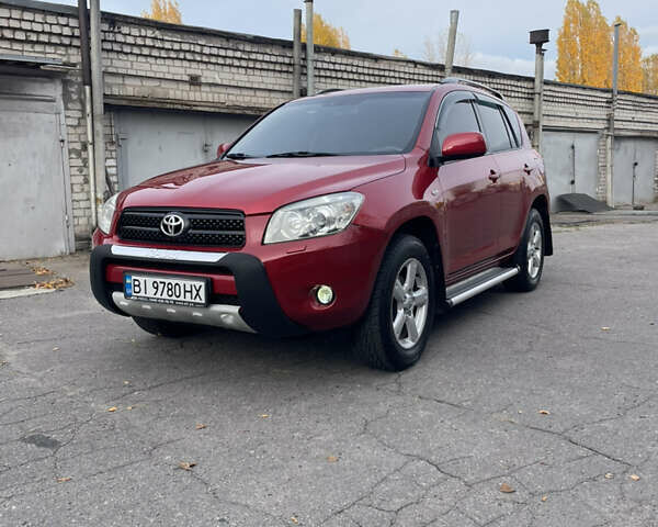 Червоний Тойота РАВ 4, об'ємом двигуна 2 л та пробігом 195 тис. км за 8999 $, фото 2 на Automoto.ua