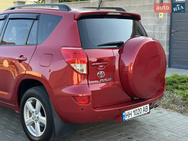 Червоний Тойота РАВ 4, об'ємом двигуна 2 л та пробігом 180 тис. км за 8999 $, фото 39 на Automoto.ua