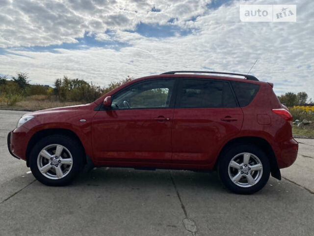 Красный Тойота РАВ 4, объемом двигателя 2 л и пробегом 244 тыс. км за 9500 $, фото 4 на Automoto.ua
