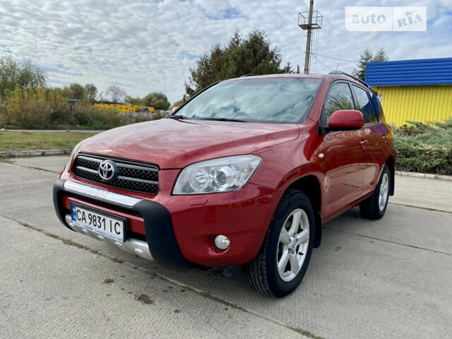 Красный Тойота РАВ 4, объемом двигателя 2 л и пробегом 244 тыс. км за 9500 $, фото 1 на Automoto.ua