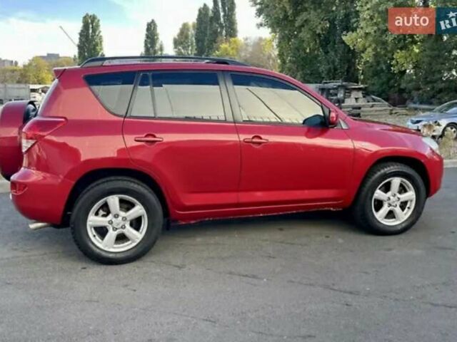 Червоний Тойота РАВ 4, об'ємом двигуна 2 л та пробігом 286 тис. км за 5700 $, фото 2 на Automoto.ua