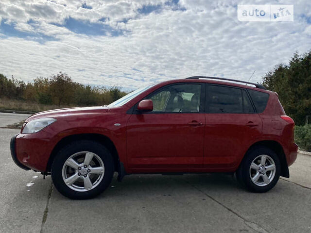 Красный Тойота РАВ 4, объемом двигателя 2 л и пробегом 244 тыс. км за 9500 $, фото 3 на Automoto.ua