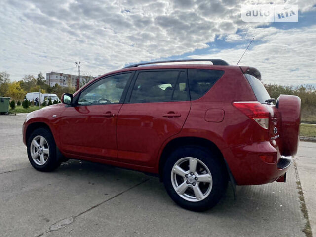 Красный Тойота РАВ 4, объемом двигателя 2 л и пробегом 244 тыс. км за 9500 $, фото 5 на Automoto.ua