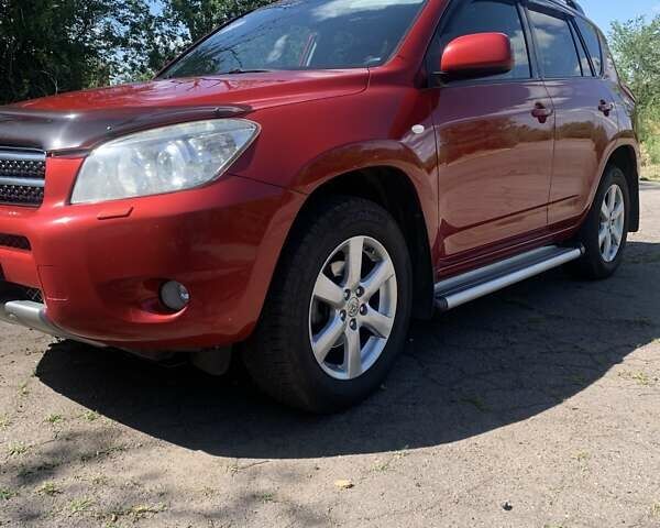 Красный Тойота РАВ 4, объемом двигателя 2 л и пробегом 229 тыс. км за 11200 $, фото 1 на Automoto.ua
