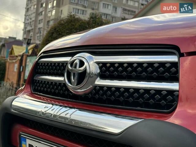 Красный Тойота РАВ 4, объемом двигателя 2.36 л и пробегом 200 тыс. км за 9999 $, фото 5 на Automoto.ua