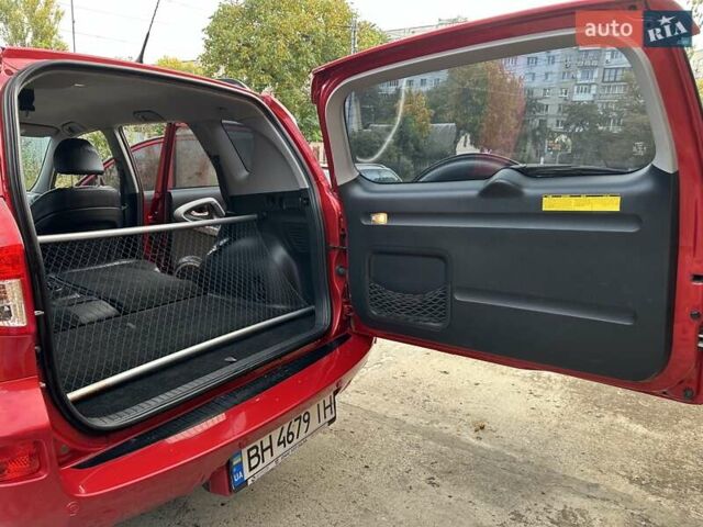 Красный Тойота РАВ 4, объемом двигателя 2.36 л и пробегом 200 тыс. км за 9999 $, фото 105 на Automoto.ua